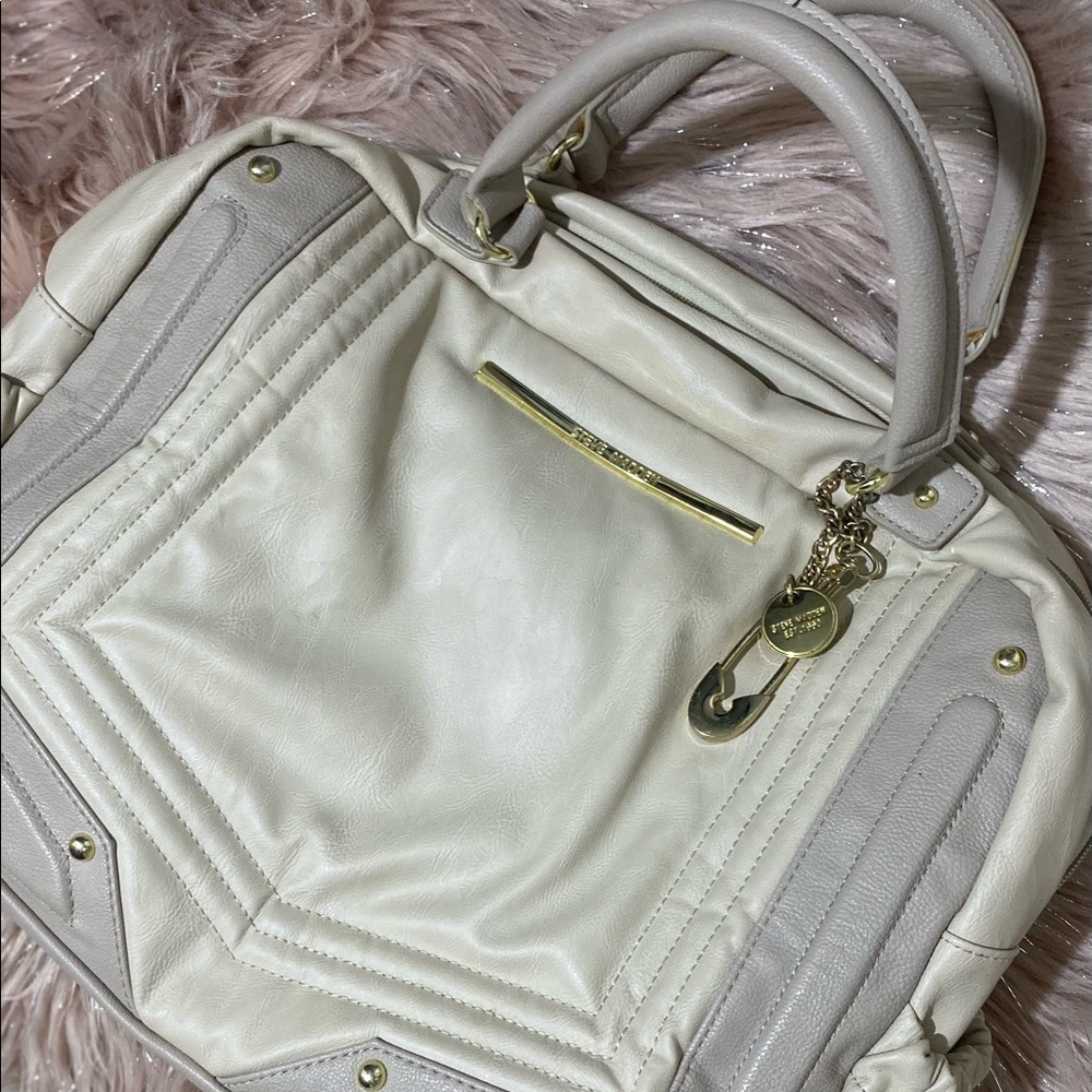 Steve Madden Tan baby diaper bag.